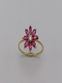Flower design ring with Ruby & a piece of Diamond