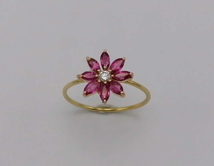 Flower design ring with Ruby & a piece of Diamond